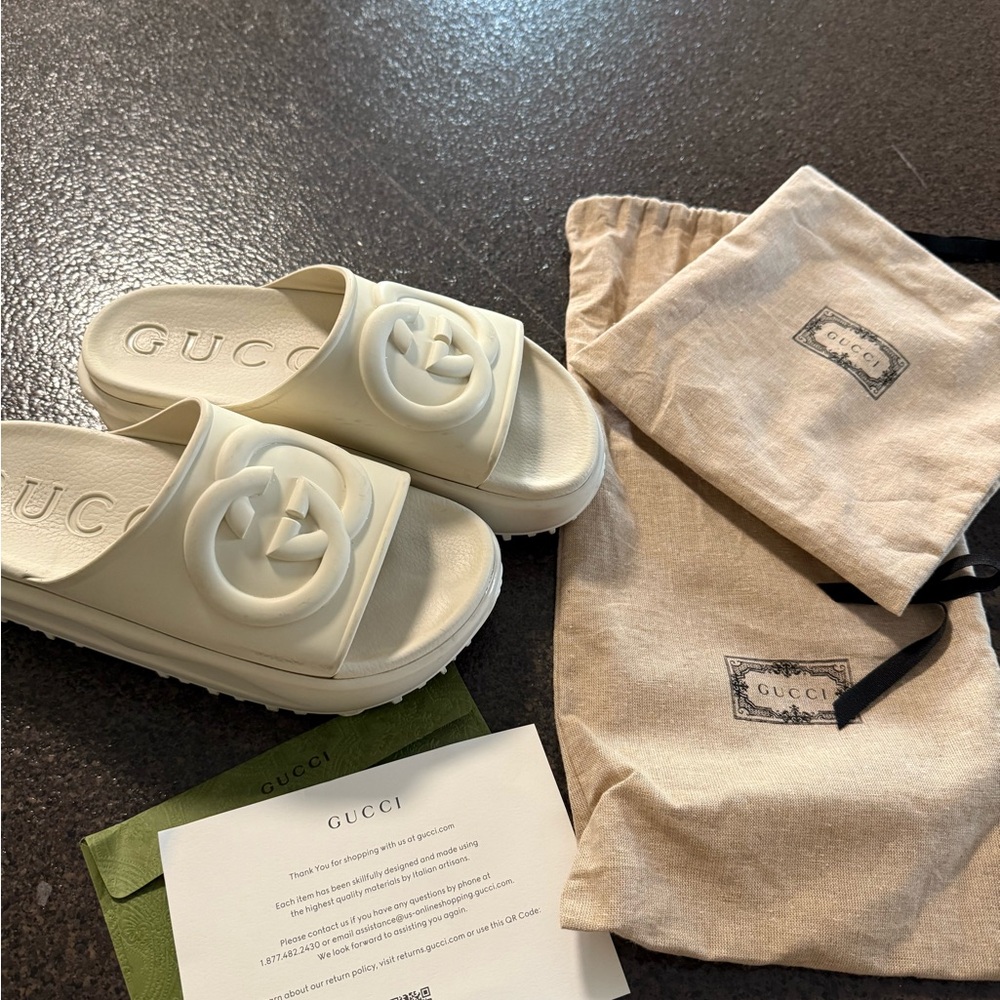 Gucci Ivory Embossed Logo Slides